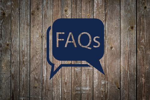 FAQs speech bubble on barn wood: Frequently Asked Questions
