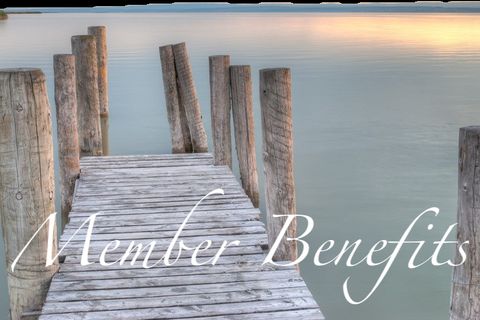 Wooden dock on a calm lake: Member Benefits