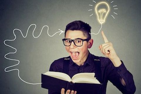 Student with a book and a lightbulb idea: Reading and Math Intervention